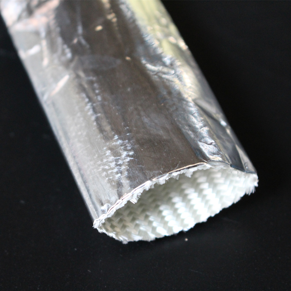 O que é a manga de fibra de vidro com reflexão de calor de alumínio?